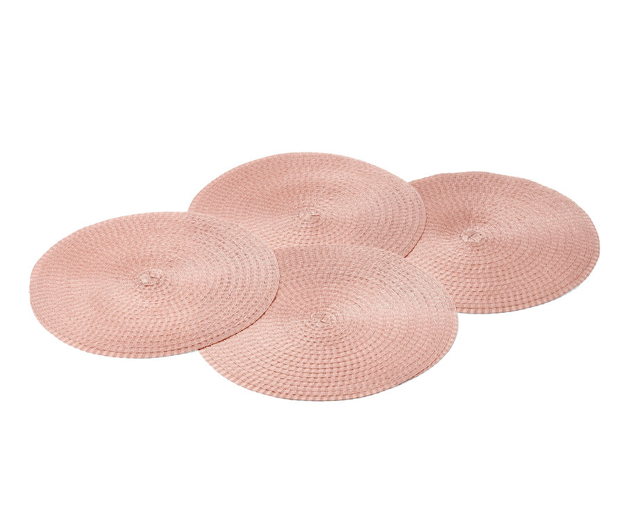 Cztery okrągłe podkładki pod talerze.
