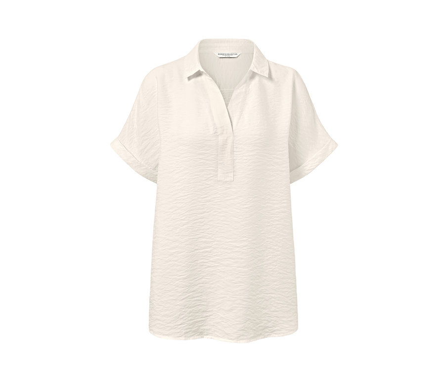 Kremowa bluzka z krótkim rękawem.
