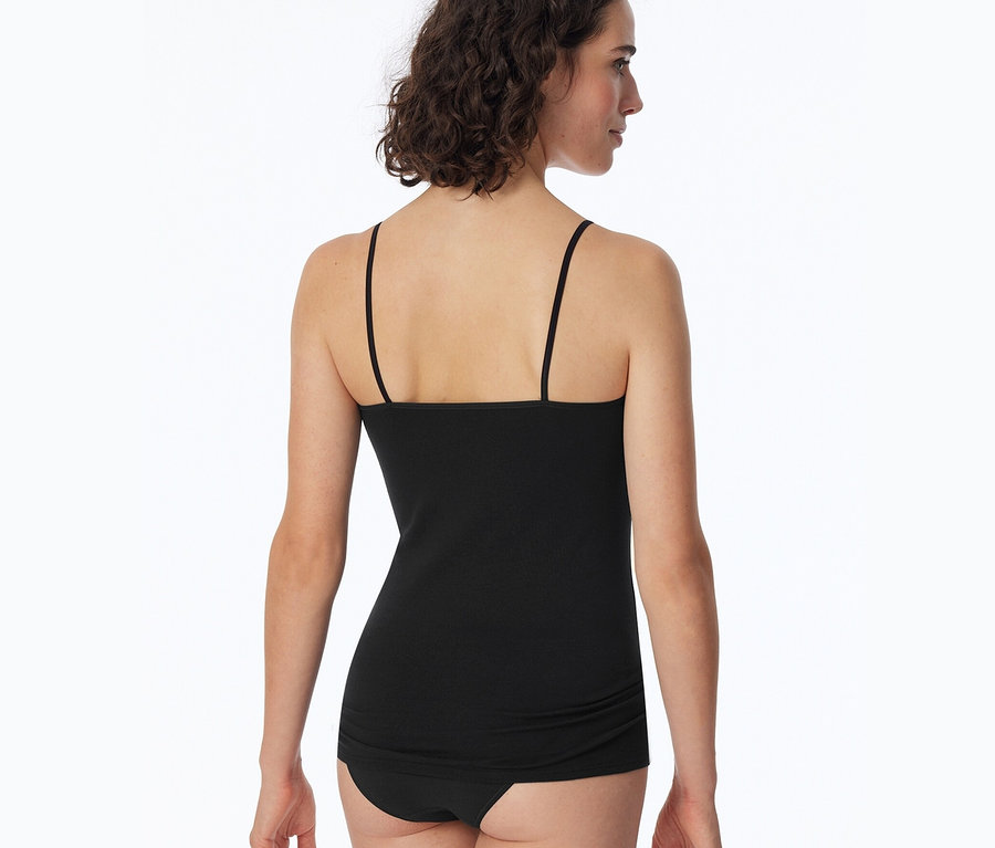 Widok z tyłu kobiety w czarnym topie SCHIESSER.