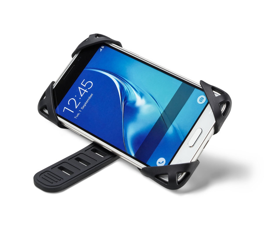 Biały smartfon przymocowany jest do czarnego uchwytu rowerowego na smartfon.