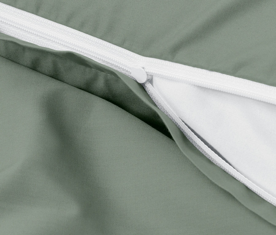 Zbliżenie na zieloną pościel perkalową w standardowym rozmiarze z zamkiem błyskawicznym.