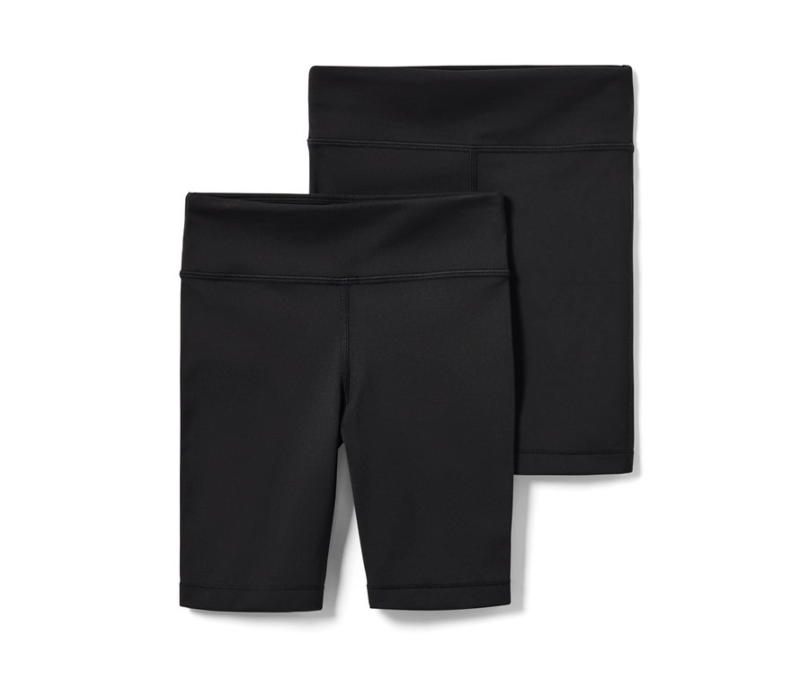 Dwie pary krótkich legginsów.