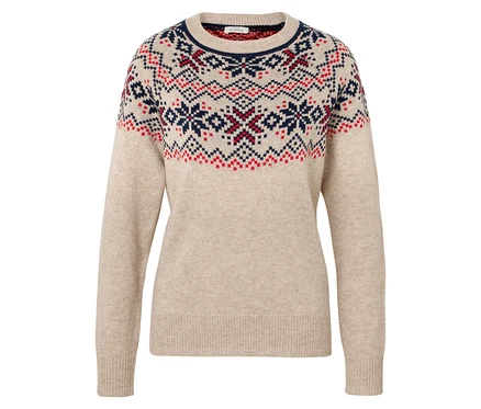 Beżowy sweter ze świątecznym wzorem.