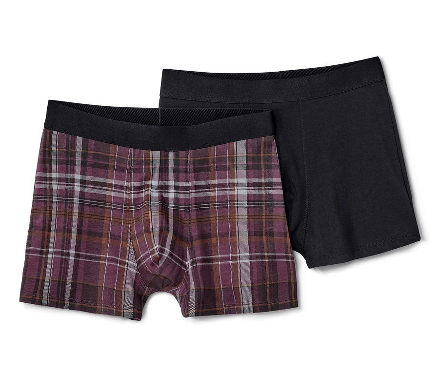 Dwie pary bokserek: jedna w kratę, druga czarna.