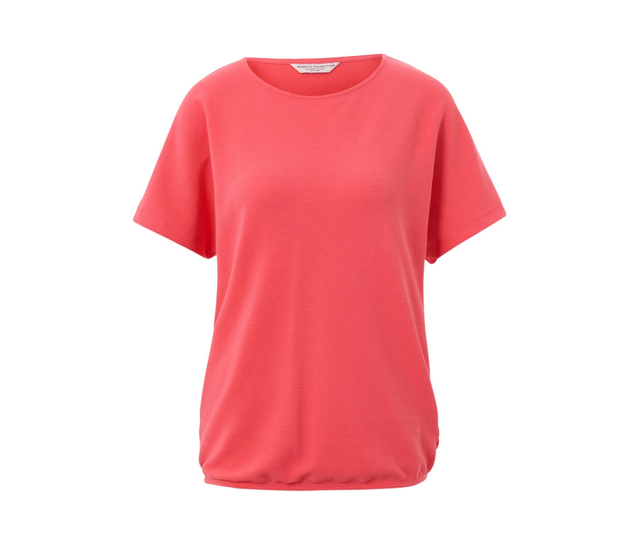 Koralowa bluzka z krótkim rękawem.