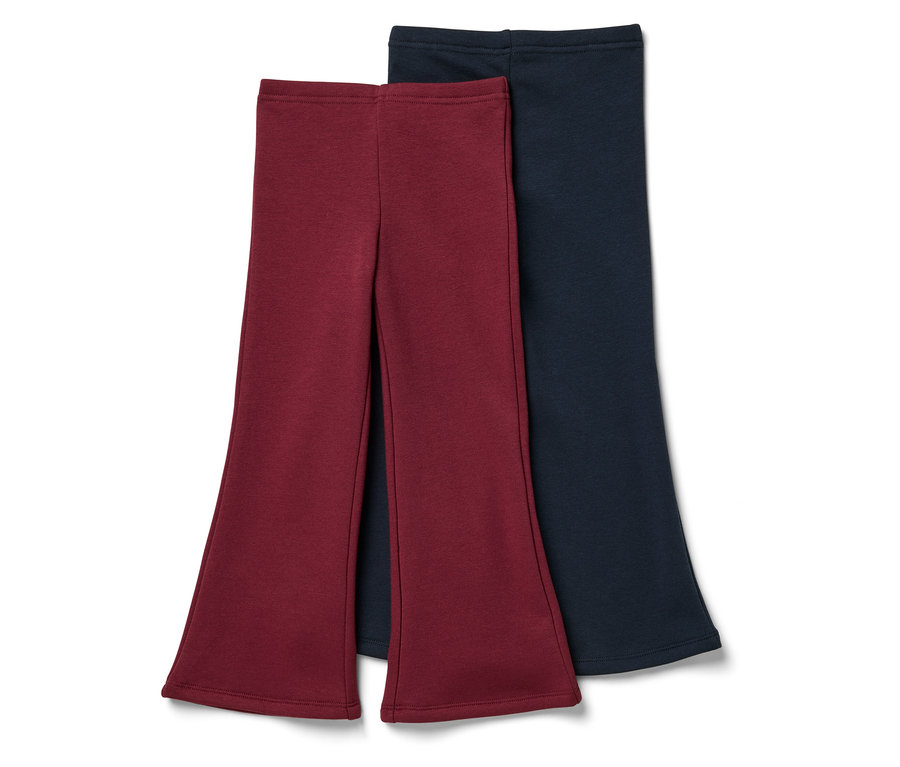 Dwie pary spodni dzwonów: jedna bordowa, a druga granatowa.