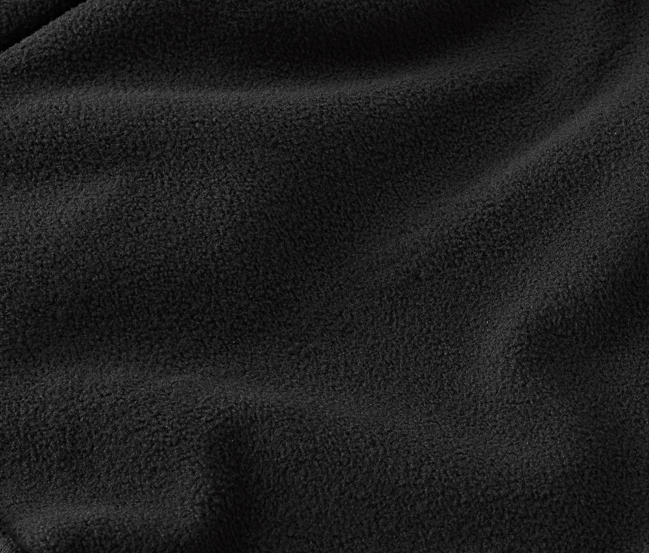 Szczegółowe zdjęcie tekstury czarnej tkaniny polarowej.