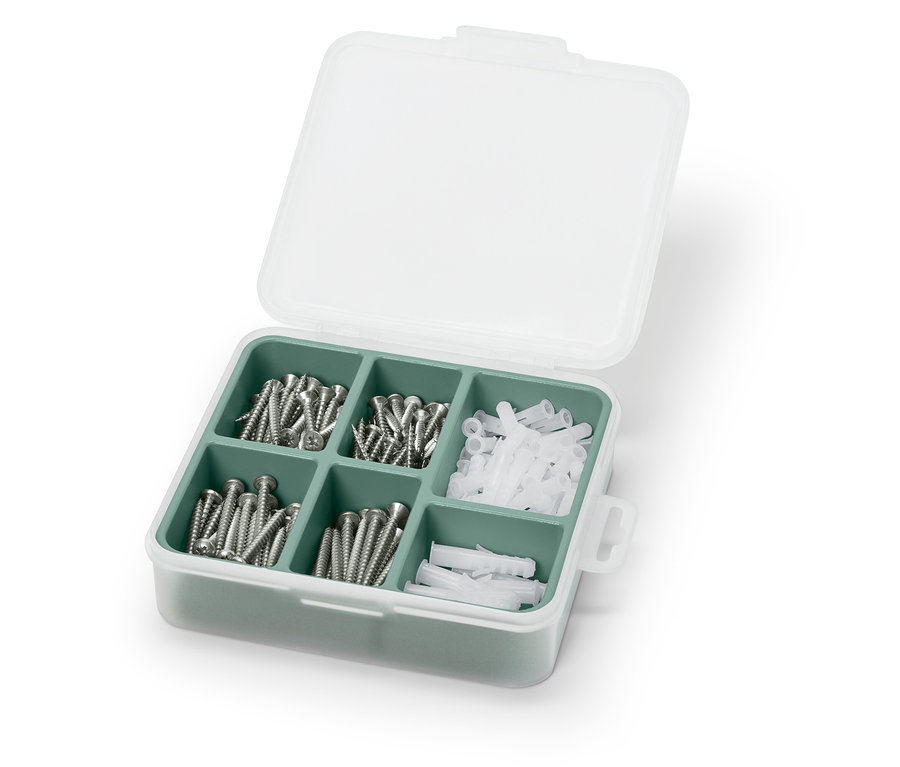 Otwarty zestaw śrub i kołków w biało-zielonej obudowie.