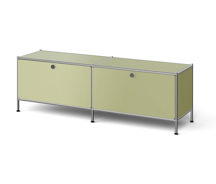 Dwuczęściowa, jasnozielona szafka z metalową ramą i nogami.