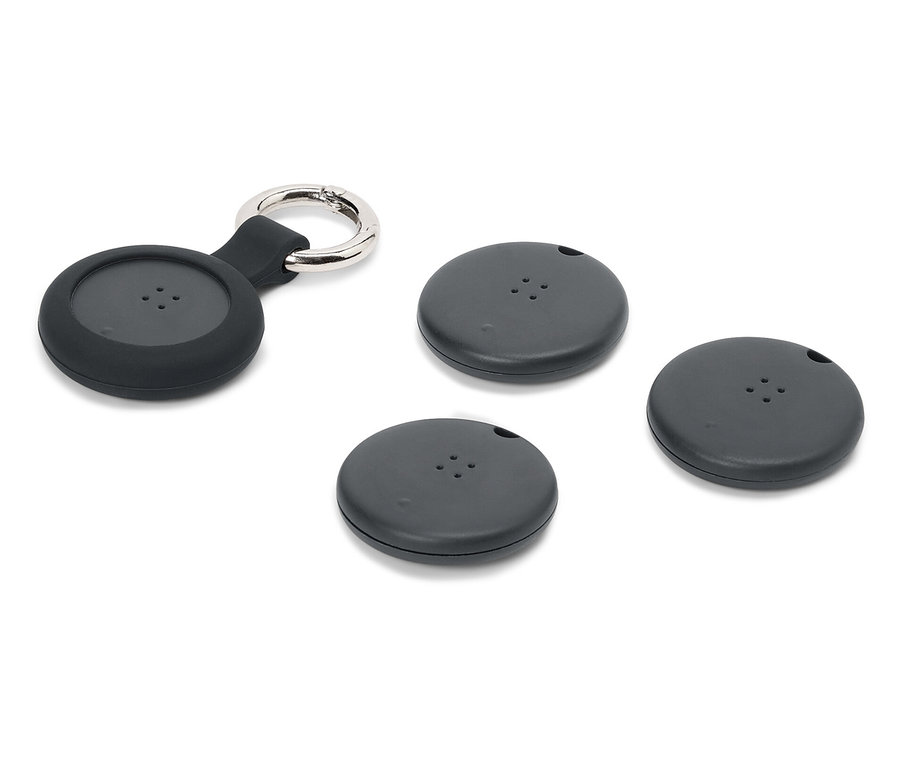 Cztery czarne lokalizatory, jeden z kółkiem na klucze, na białym tle.