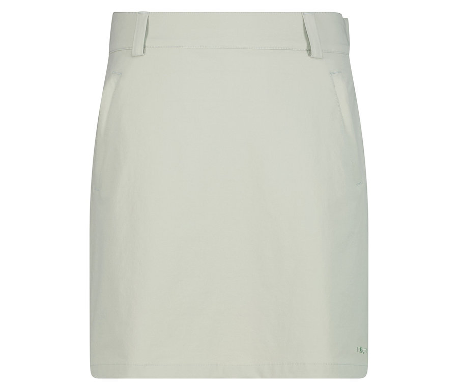 Na białym tle widać jasnozieloną spódnicę.