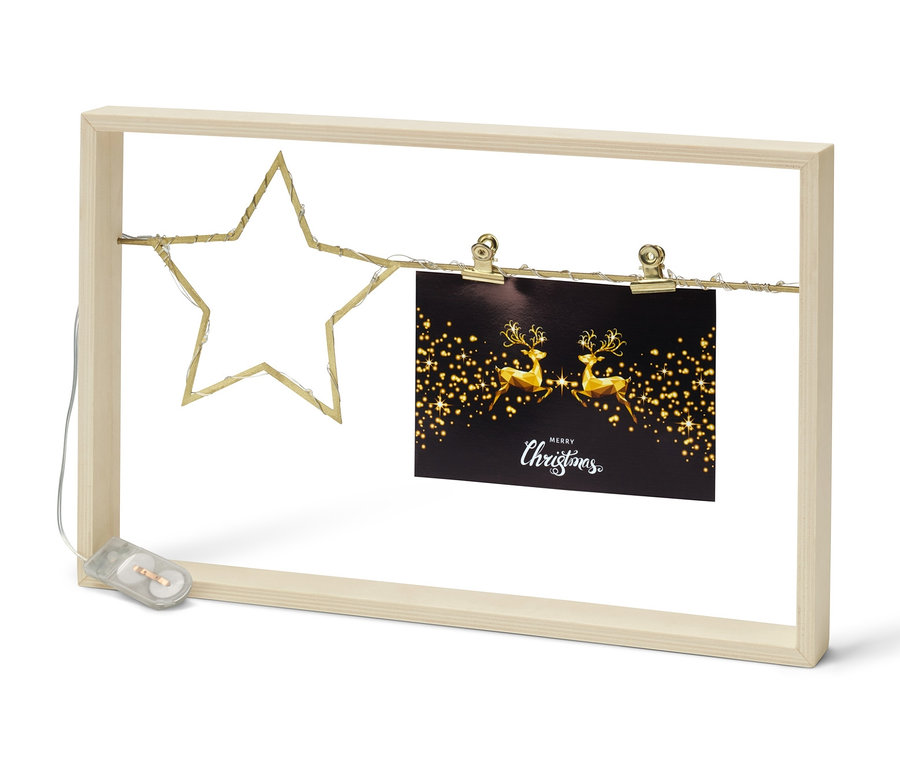 Ozdobna ramka LED ze świątecznym obrazkiem i gwiazdą.