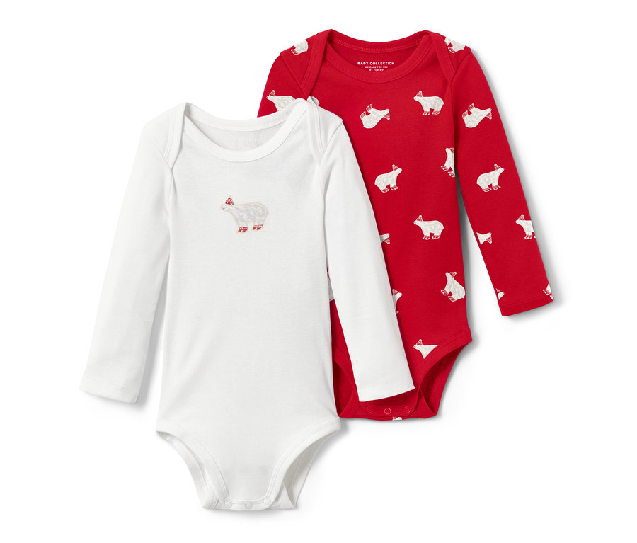 Dwa dziecięce body z długim rękawem: jedno białe z motywem misia polarnego, drugie czerwone w powtarzający się wzór misiów polarnych.