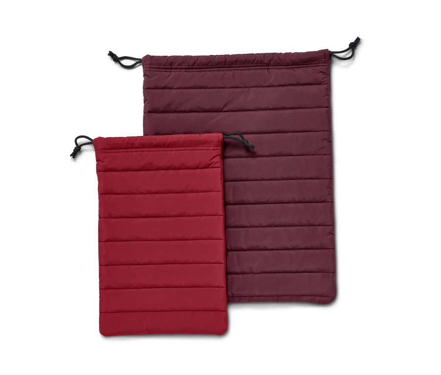 Dwa pikowane organizery: jeden czerwony, drugi bordowy.