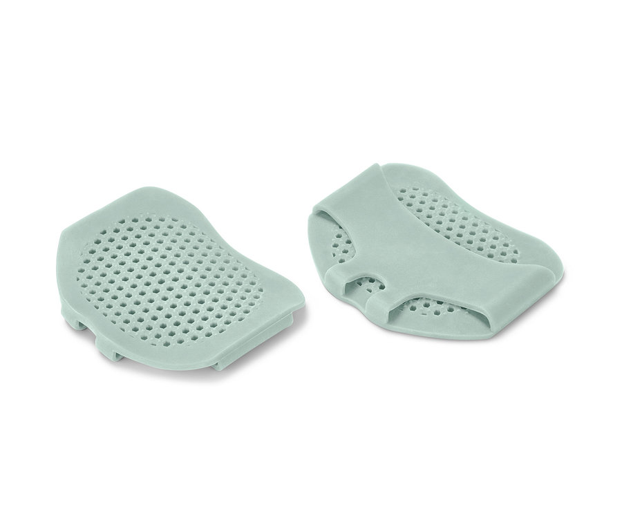 Dwie jasnozielone poduszki na haluksy.