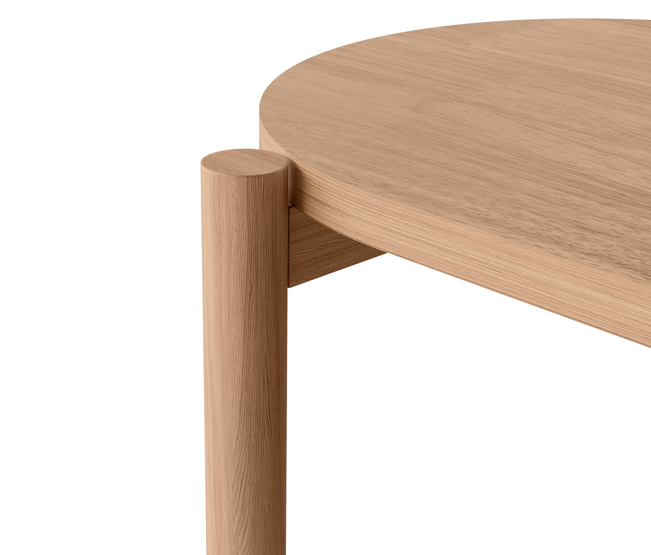 Detal okrągłego drewnianego stolika z nogą.