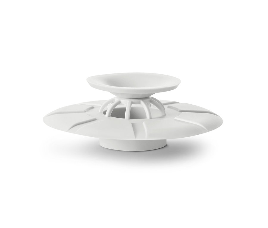 Białe sitko i korek do odpływu.