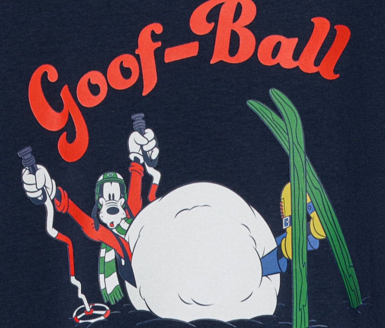 Postać z kreskówki Goofy ze sprzętem narciarskim w śnieżnej scenerii z napisem "Goof-Ball".