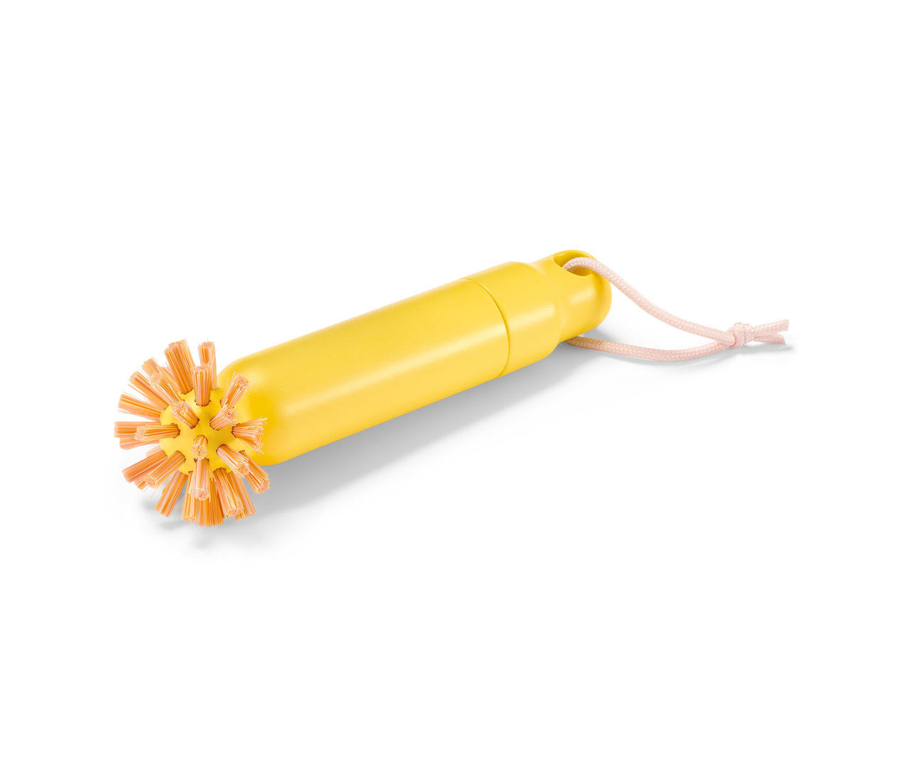 Żółta szczotka do odpływu 2 w 1 z pomarańczowym włosiem i różowym sznurkiem do zawieszania.
