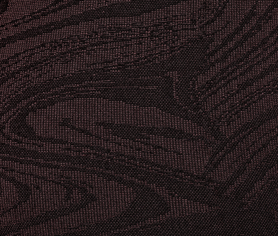 Zbliżenie na legginsy bezszwowe z ciemnobrązowym wzorem.