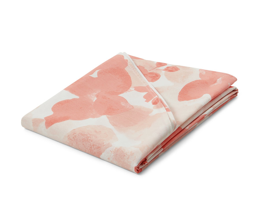 Złożony owalny obrus ogrodowy z łososiowym kwiatowym wzorem, ok. 160 x 220 cm.