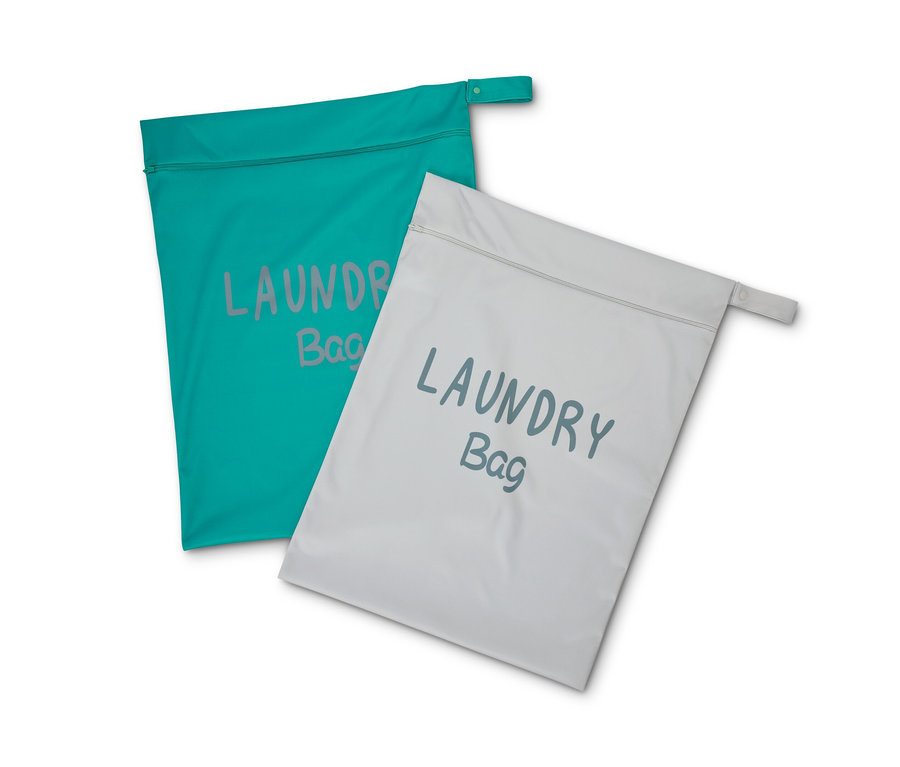 Dwie torby podróżne na pranie, jedna turkusowa i jedna szara.