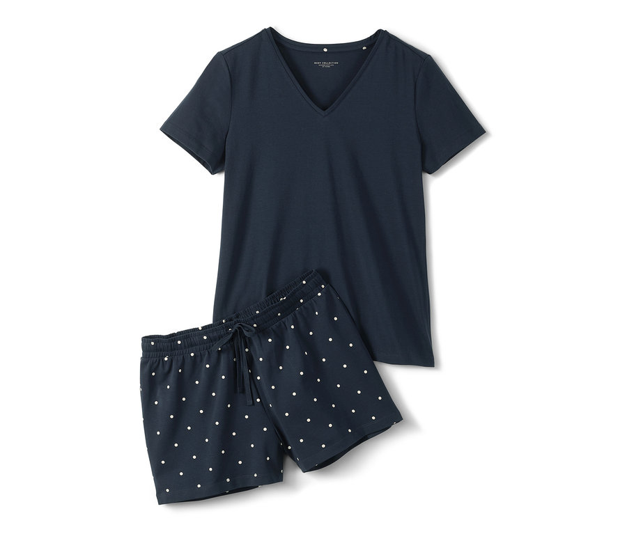 Granatowa piżama z krótkimi spodenkami w białe kropki.