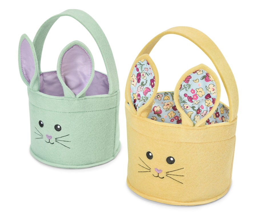 Dwa koszyki wielkanocne w kształcie króliczka, jeden jasnozielony i jeden żółty.