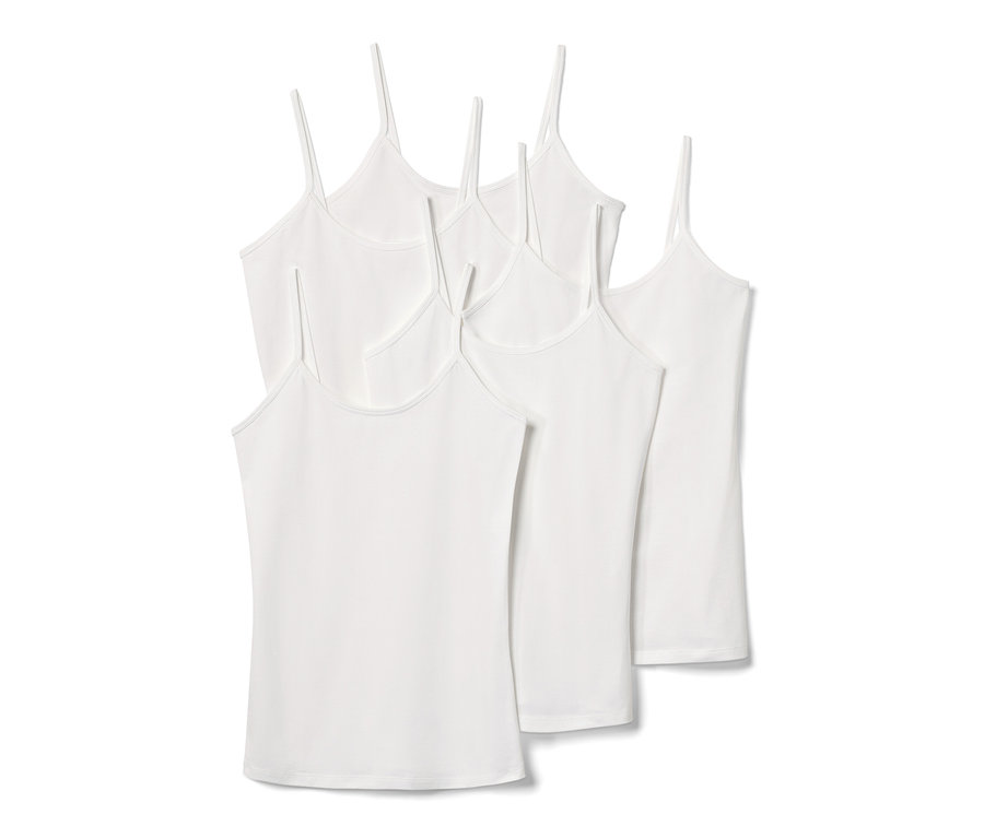 Pięć białych koszulek na ramiączkach spaghetti.