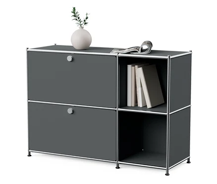 Szara metalowa szafka typu sideboard „CN3” z 2 klapami, na górze wazon i gazeta.