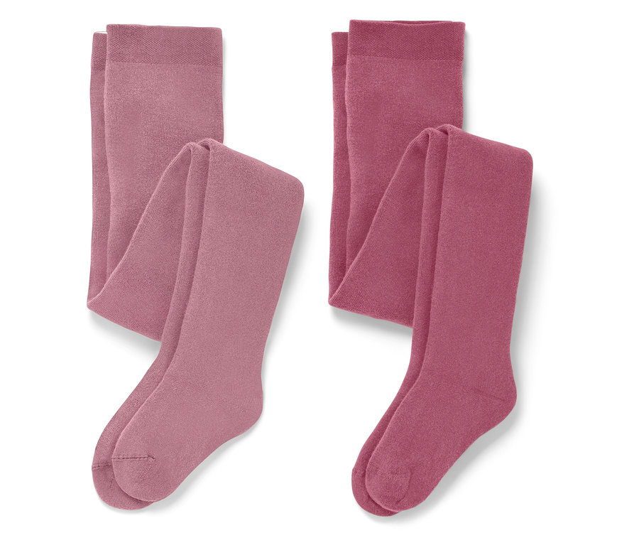 Dwie złożone pary rajstop w odcieniach różu.