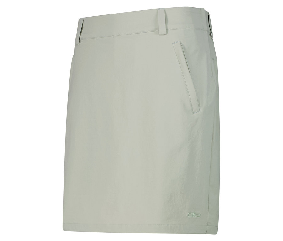 Jasnozielona spódnica z kieszenią na białym tle.