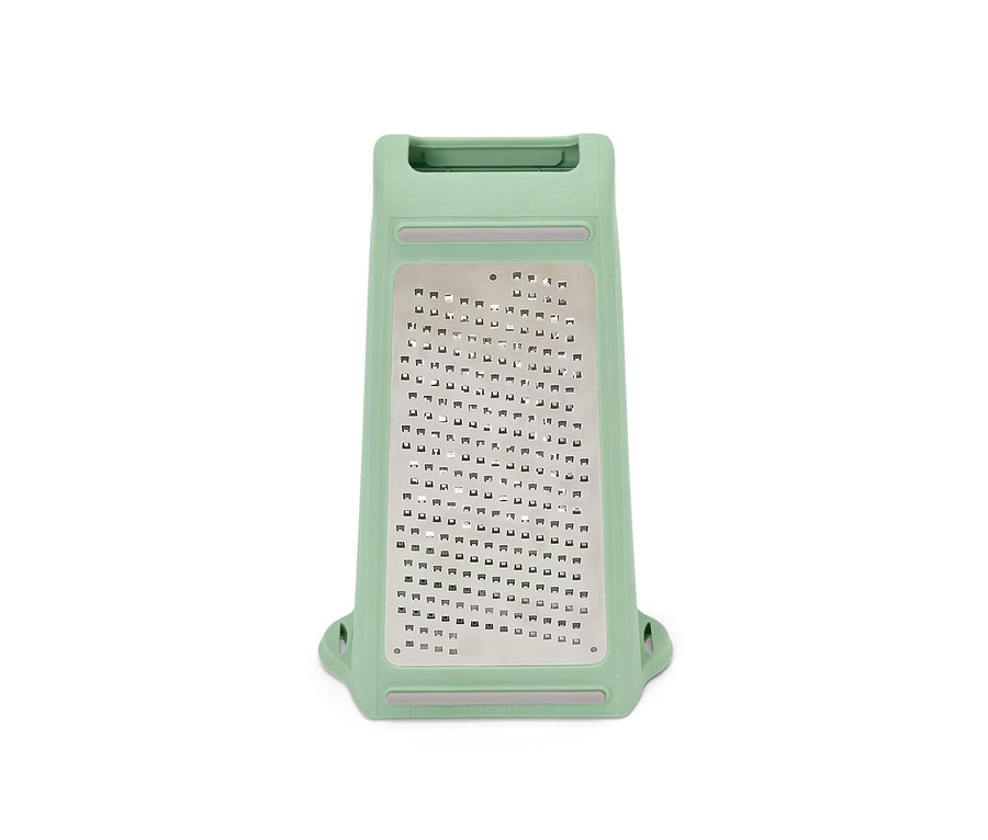 Zielona tarka dwukierunkowa z pojemnikiem na białym tle.