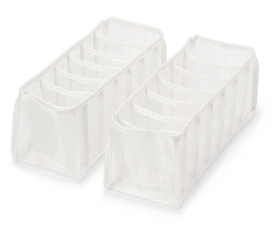 Dwa białe organizery do szuflad z sześcioma przegródkami na białym tle.