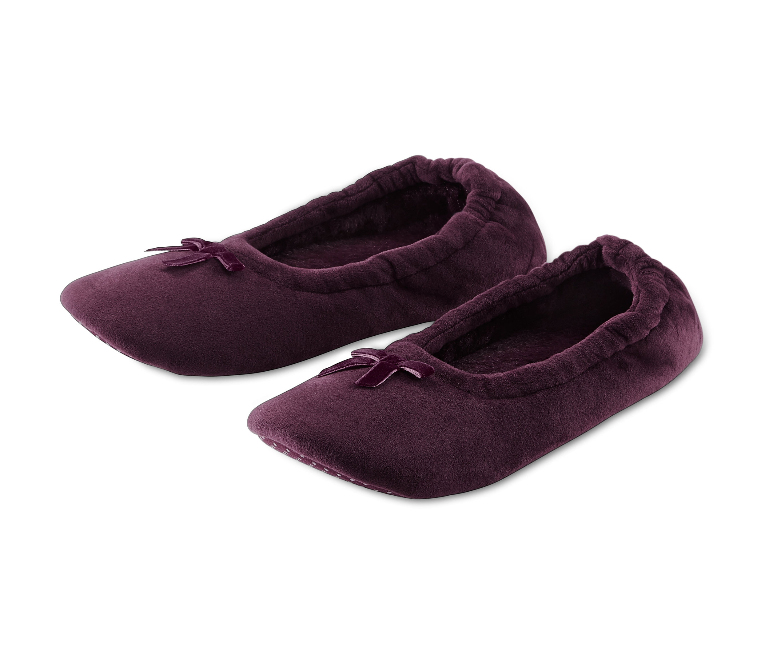 Dwie pary fioletowych kapci balerin z kokardką.