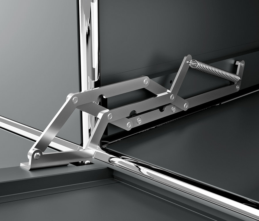 Szczegół szarej metalowej szafki CN3 z klapą i mechanizmem.