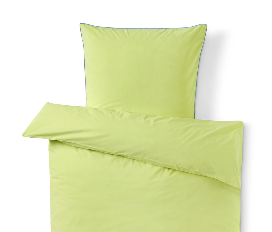 Żółta pościel z bawełny renforcé w standardowym rozmiarze, składająca się z poszewki na poduszkę i kołdrę.