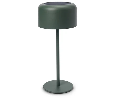 Pojedyncza zielona lampa stołowa stojąca na białym tle.