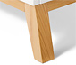 Biała komoda z półkami o regulowanej wysokości i szufladami